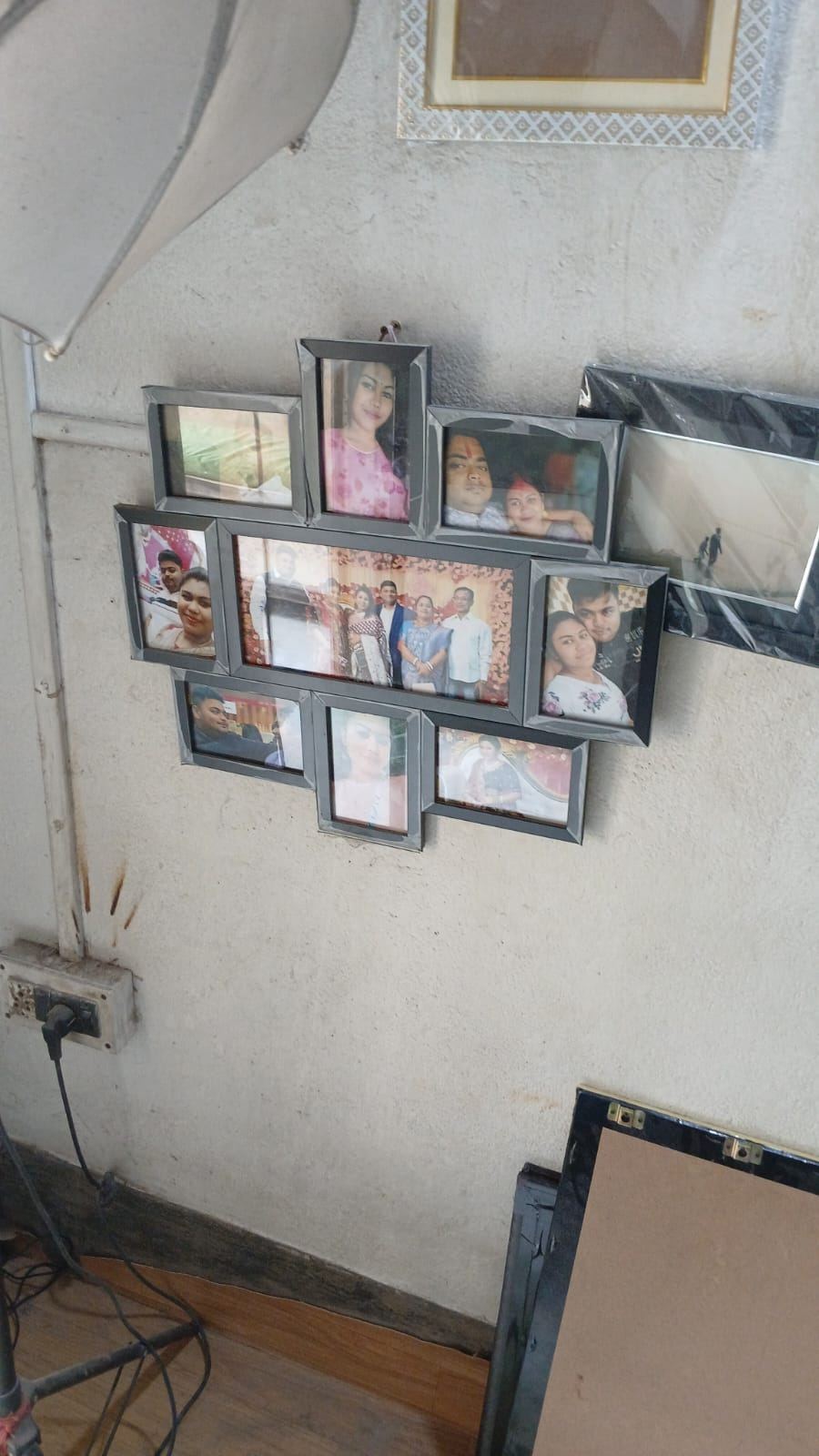 Multi-photo collage frame made at Roy Studio with family wedding photos